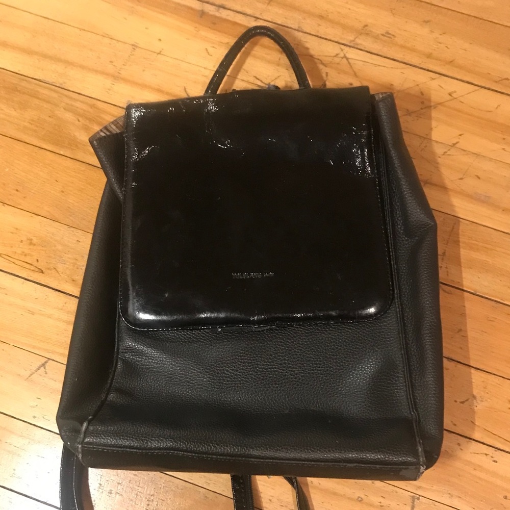 Small black leather bag